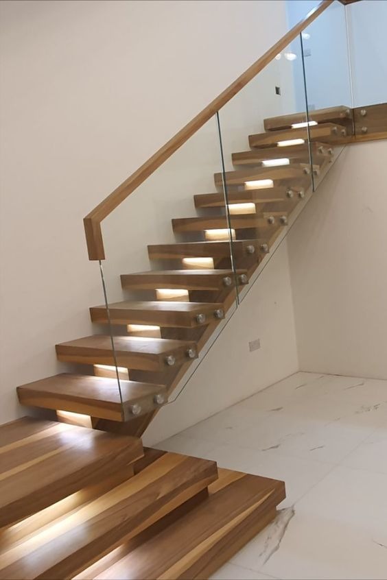 Glass staircase railing by Jitendra Enterprises